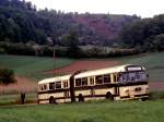 Henschel/321957/luxemburg-lamadelaine-henschel-hs-160-usl-g Luxemburg, Lamadelaine, Henschel HS 160 USL-G Gelenkbus. Dieser Bus bringt auf schmalen Wegen die Fahrgste der Museumsbahn Fond-de-Gras zum ehemaligen Terminus 'Fuussbsch'. Scan eines Dias aus dem Jahr 1976. 