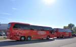 2 mal URB Busse in Krems,links ein Neoplan Cityliner und rechts ein MAN Lions Coach,Krems Juli 2013.