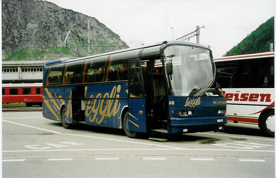 (032'919) - Heggli, Kriens - Nr. 68/LU 15'768 - Neoplan am 27. Juni 1999 beim Bahnhof Andermatt