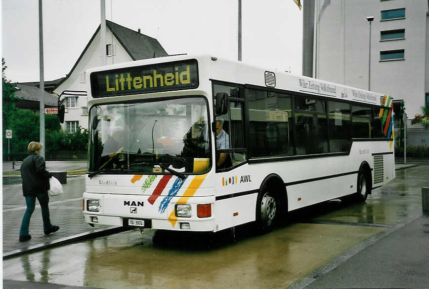 (048'422) - AWL Littenheid - TG 3974 - MAN/Lauber am 18. Juli 2001 beim Bahnhof Wil