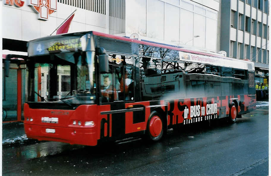 (051'011) - SBC Chur - Nr. 8/GR 97'508 - Neoplan am 27. Dezember 2001 beim Bahnhof Chur