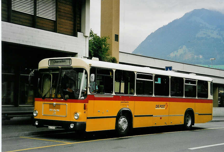 (054'507) - Dillier, Sarnen - Nr. 4/OW 10'001 - MAN am 22. Juli 2002 beim Bahnhof Sarnen