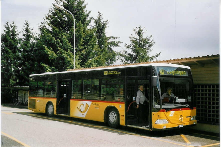 (069'307) - Lang, Wenslingen - BL 7386 - Mercedes am 10. Juli 2004 beim Bahnhof Gelterkinden