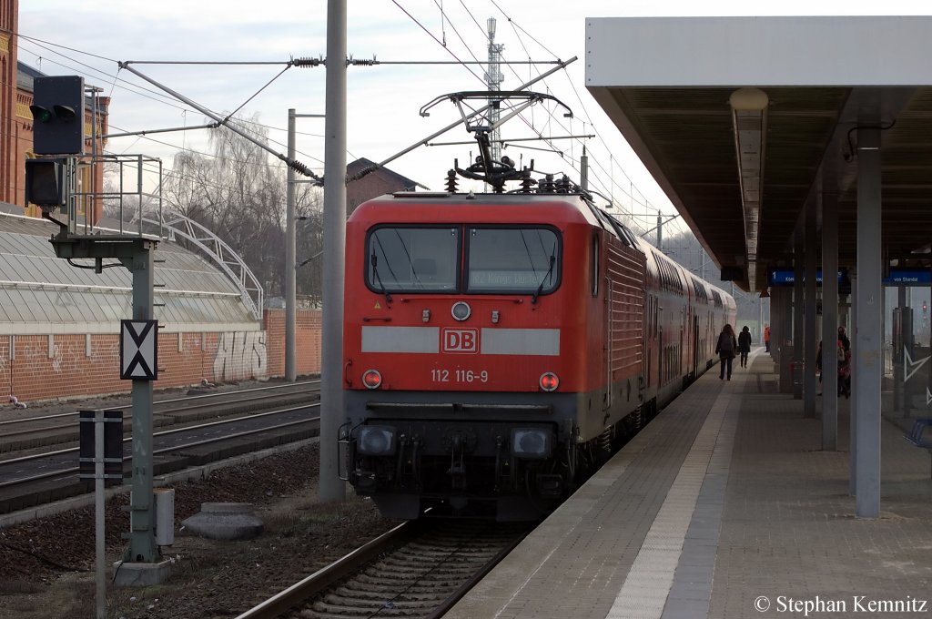 112 116-9 mit dem RE2 (RE 37377) nach K�nigs Wusterhausen in Rathenow. 10.02.2011