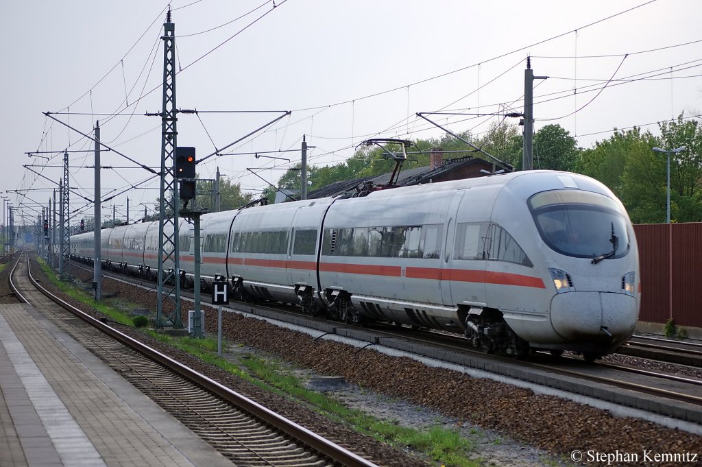 BB ICE-T 4011 590-9  Wien  und eine weitere 4011er durchfahren gerade den Bahnhof Rathenow. Welche Zugnummer dieser Zug hat und von wo und wohin er fhrt entzieht sich meiner Kenntnis. 27.04.2011