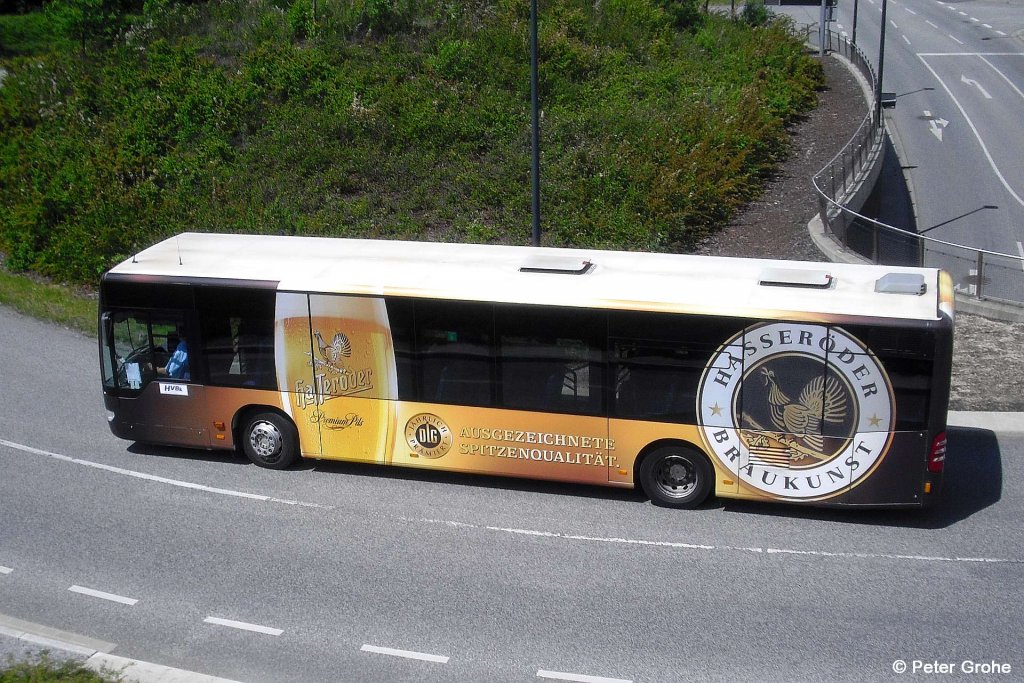 Stadtbus HVB ( Harzer Verkehrsbetriebe GmbH ) mit Werbung fr Brauerei Hasserder, fotografiert in Wernigerode am 09.06.2012