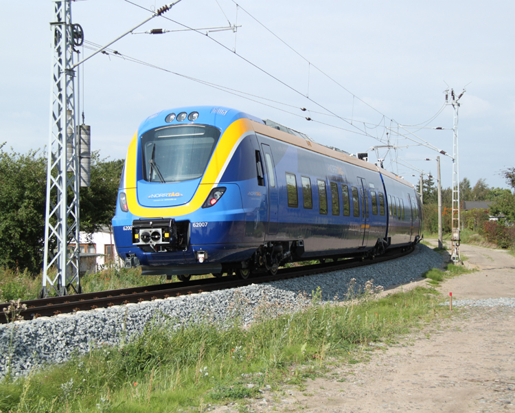 Triebwagen X60(62007)NorrTag als berfhrung nach Schweden in Hhe Rostock Hbf.21.09.2011