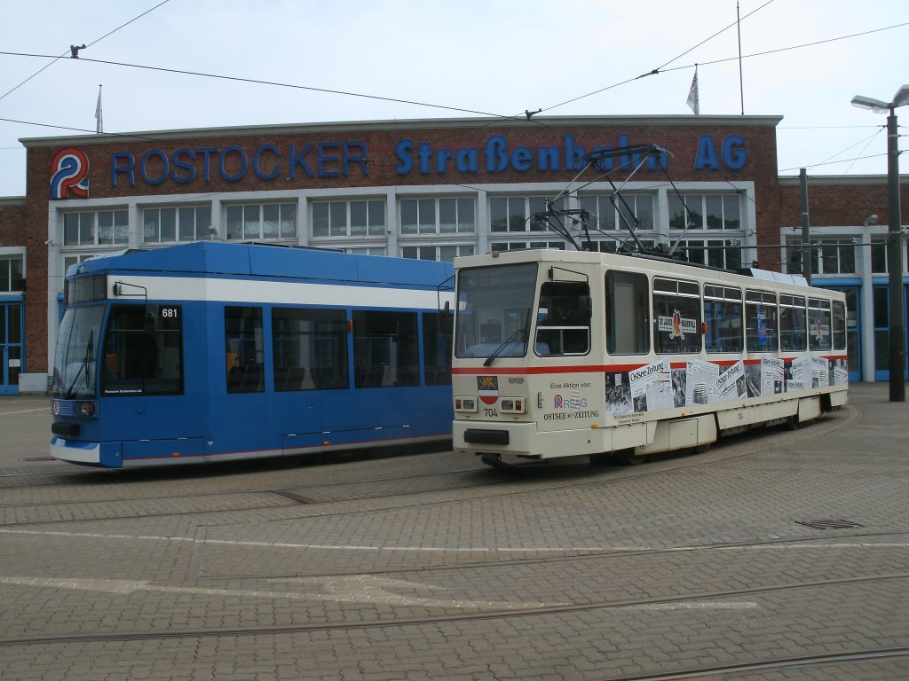 Vor der Triebwagenhalle im Rostocker Depot Hamburger Stra�e standen,am 09.Mai 2013,der Tw 681 und 704.