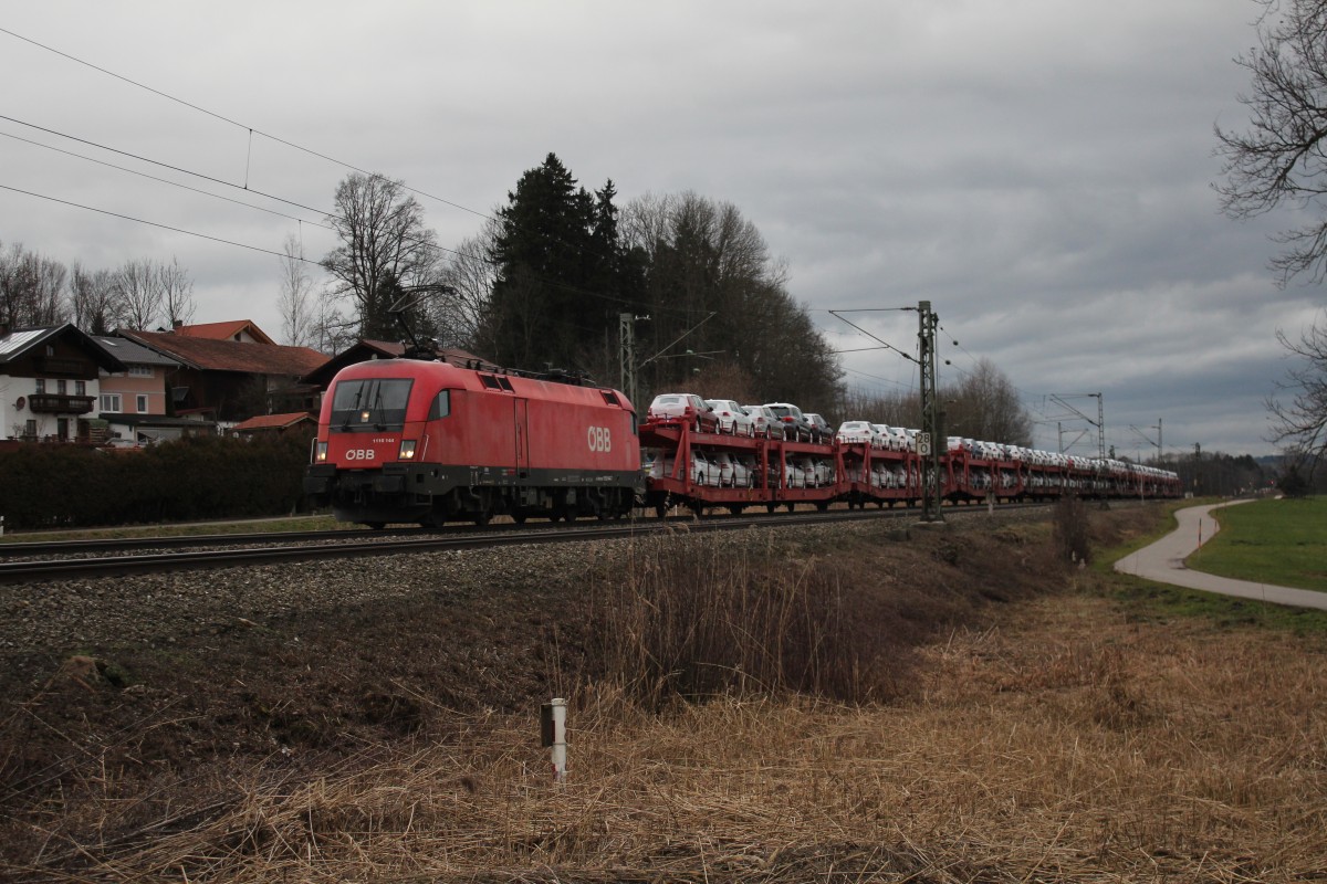 1116 144-5 mit einem Autozug aus M�nchen kommend am 14. Januar 2015 bei Weisham.