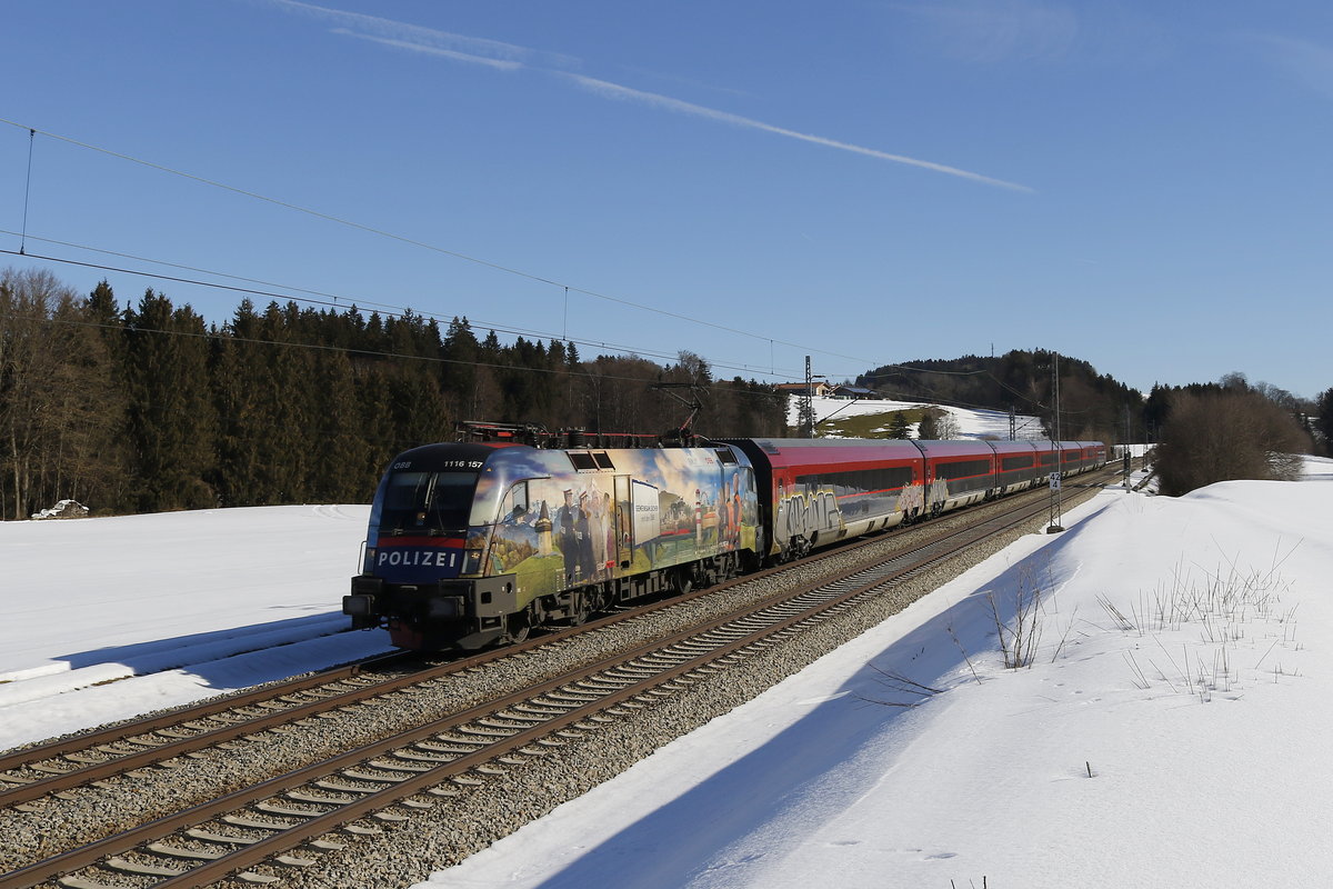 1116 157 mit einem  Railjet  aus Salzburg kommend am 17. Februar 2019 bei H�tt.