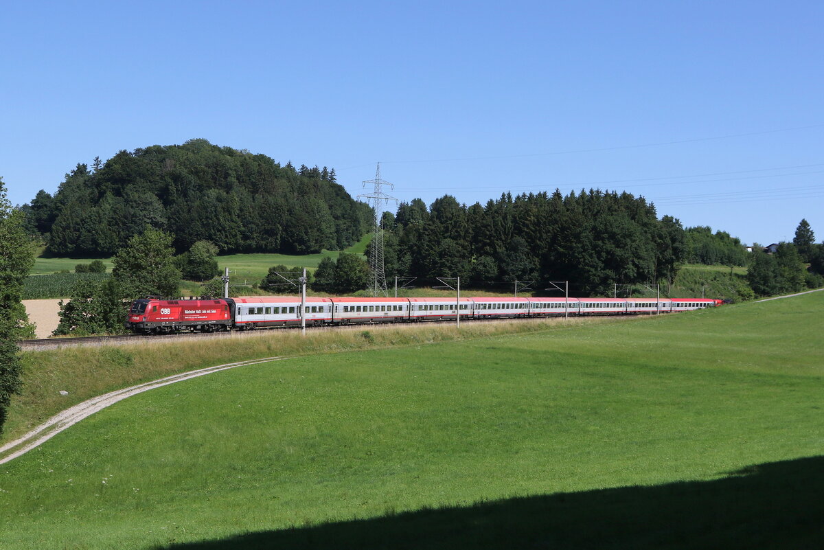 1116 199  N�chster Halt: Job mit Sinn  mit einem  EC  aus Salzburg kommend. Aufgenommen am 19. Juli 2025 bei Vachendorf im Chiemgau.