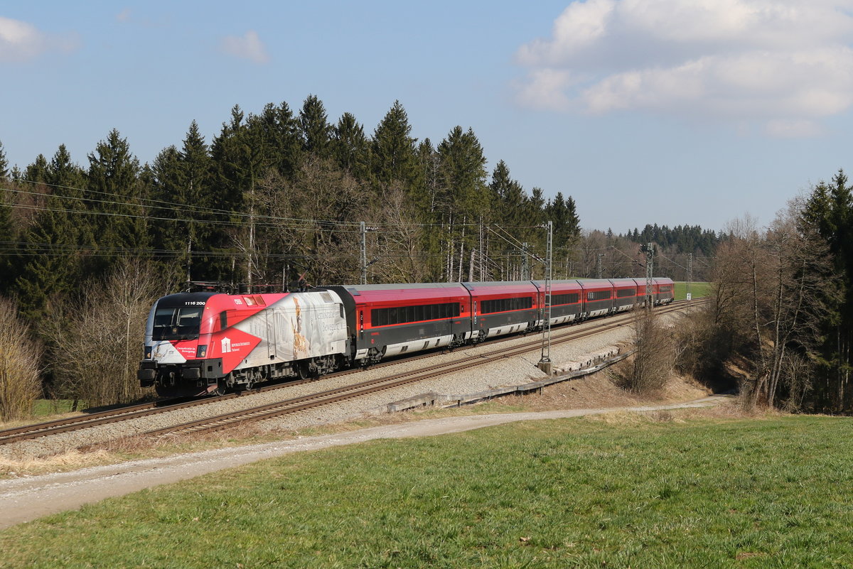 1116 200  Demokratie in Bewegung  mit einem Railjet aus Salzburg kommend am 18. M�rz 2020 bei Grabenst�tt.