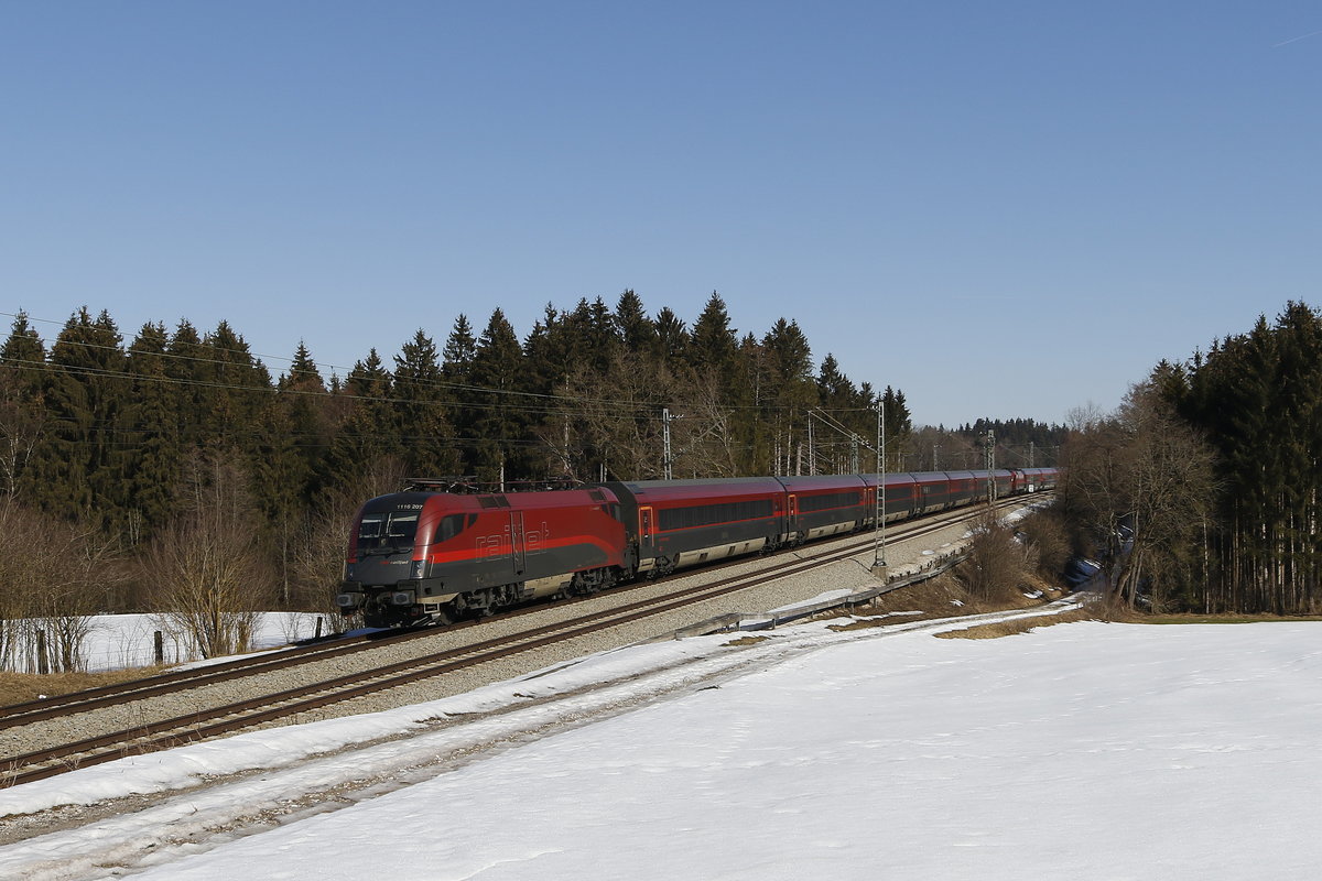 1116 207 mit einem  Railjet  aus Salzburg kommend am 23. Februar 2019 bei Grabenst�tt.