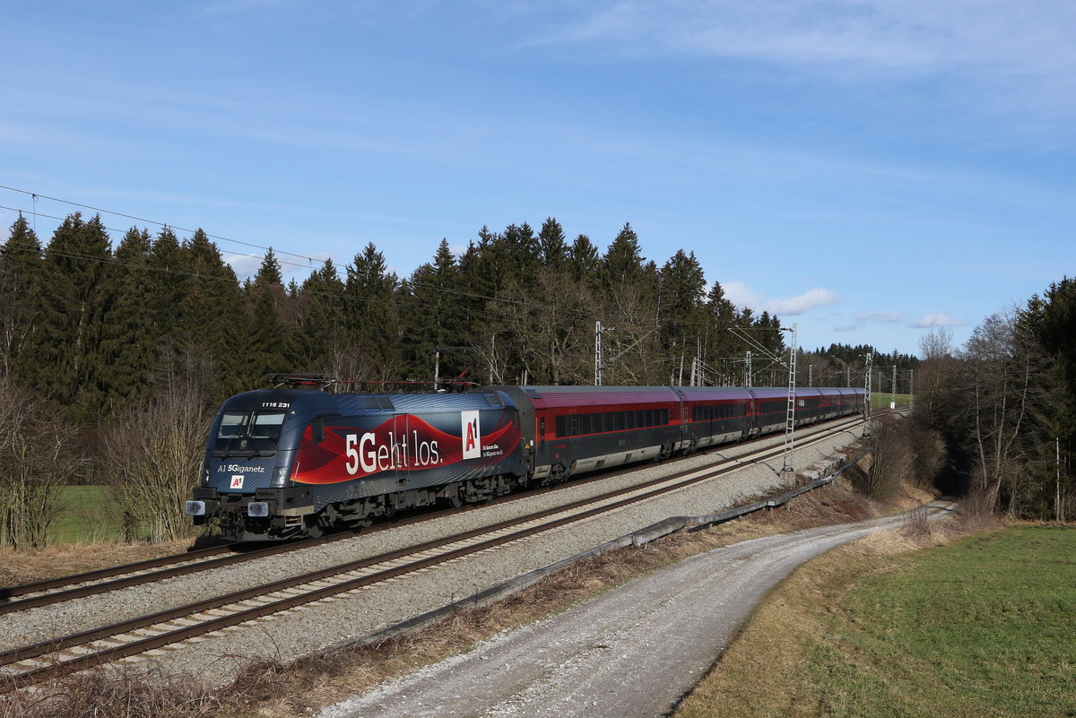 1116 231  5 geht los  mit einem Railjet aus Salzburg kommend am 4. Februar 2021 bei Grabensttt im Chiemgau.