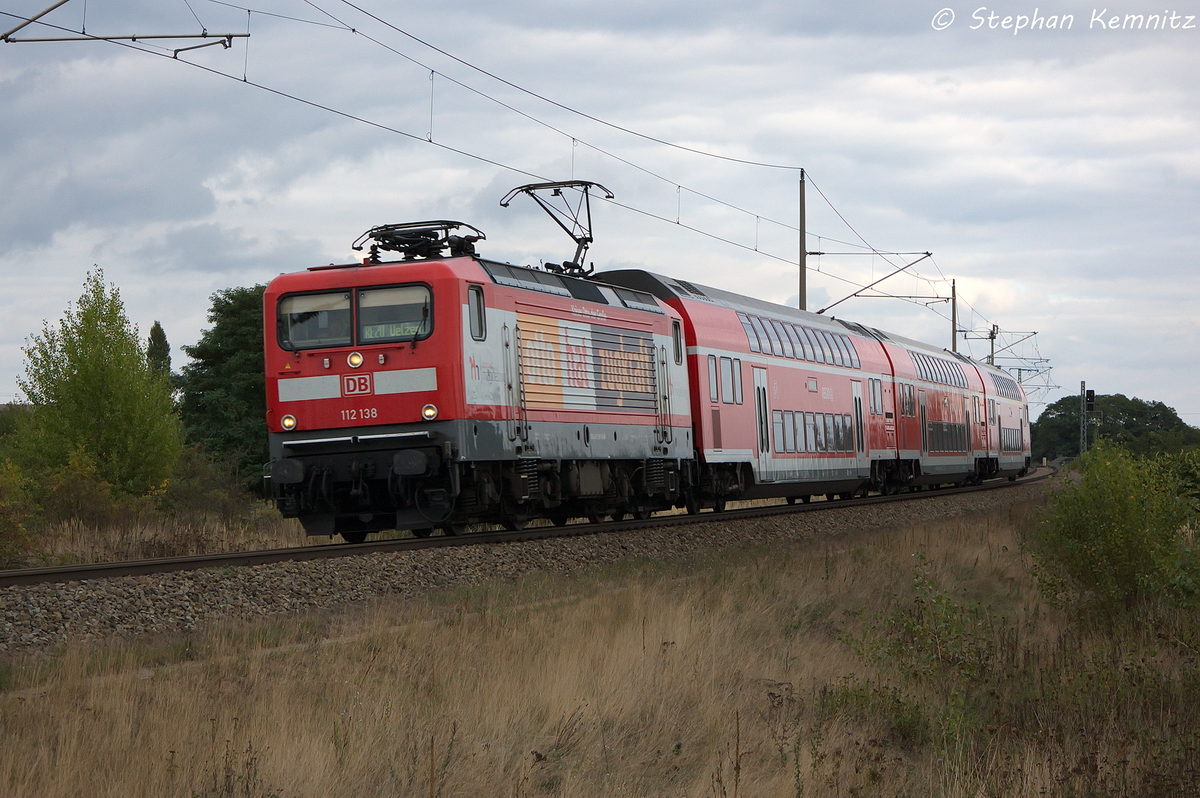 112 138-3  Otto hat Zugkraft  mit dem RE20 (RE 17620) von Halle(Saale)Hbf nach Uelzen in Stendal(Wahrburg). 21.09.2013