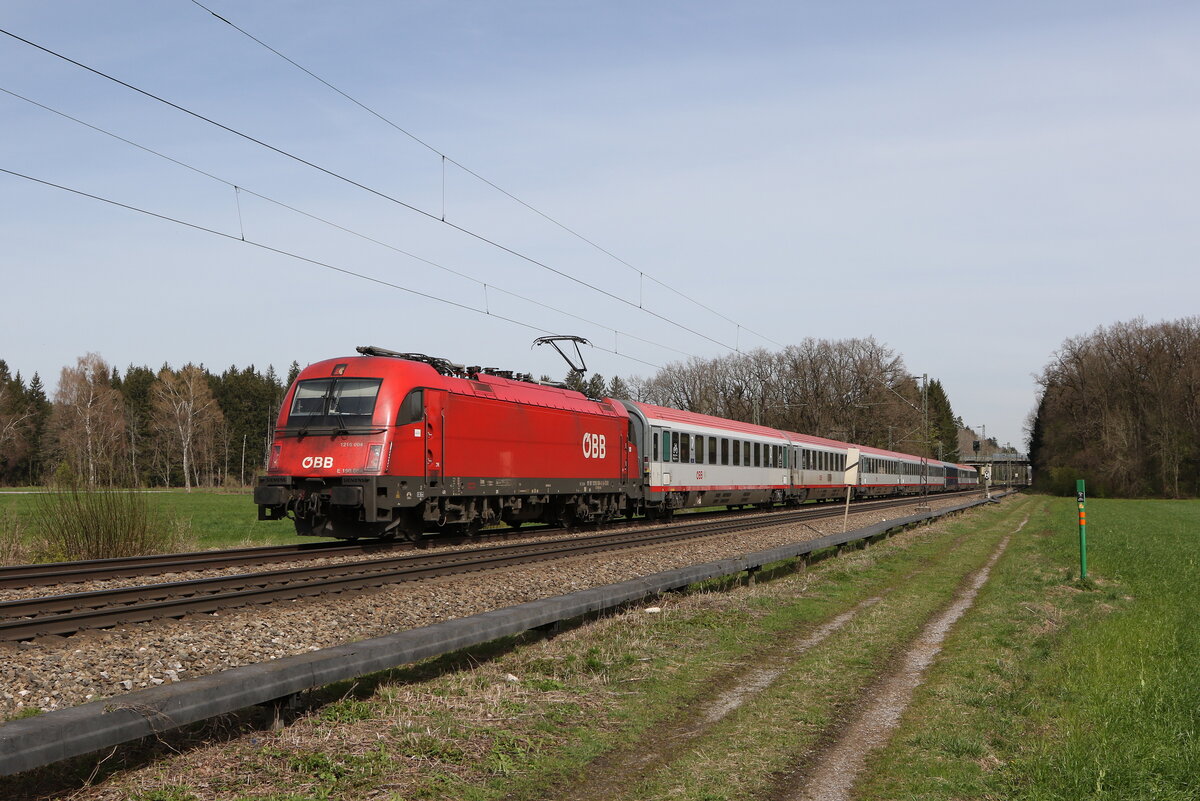 1216 004 mit einem  EC  aus M�nchen kommend am 26. M�rz 2024 bei Brannenburg im Inntal.