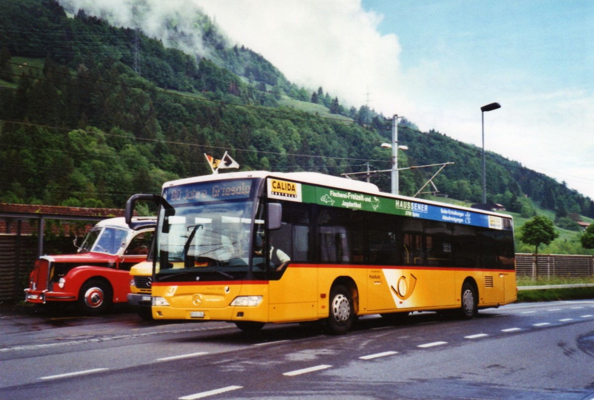 (126'610) - PostAuto Bern - BE 653'384 - Mercedes am 29. Mai 2010 beim Bahnhof Reichenbach