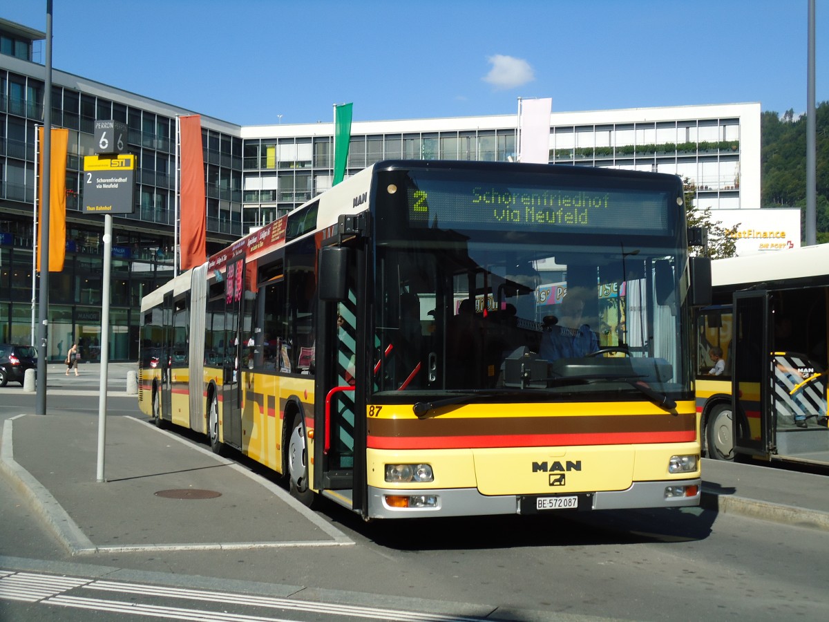 (129'306) - STI Thun - Nr. 87/BE 572'087 - MAN am 4. September 2010 beim Bahnhof Thun