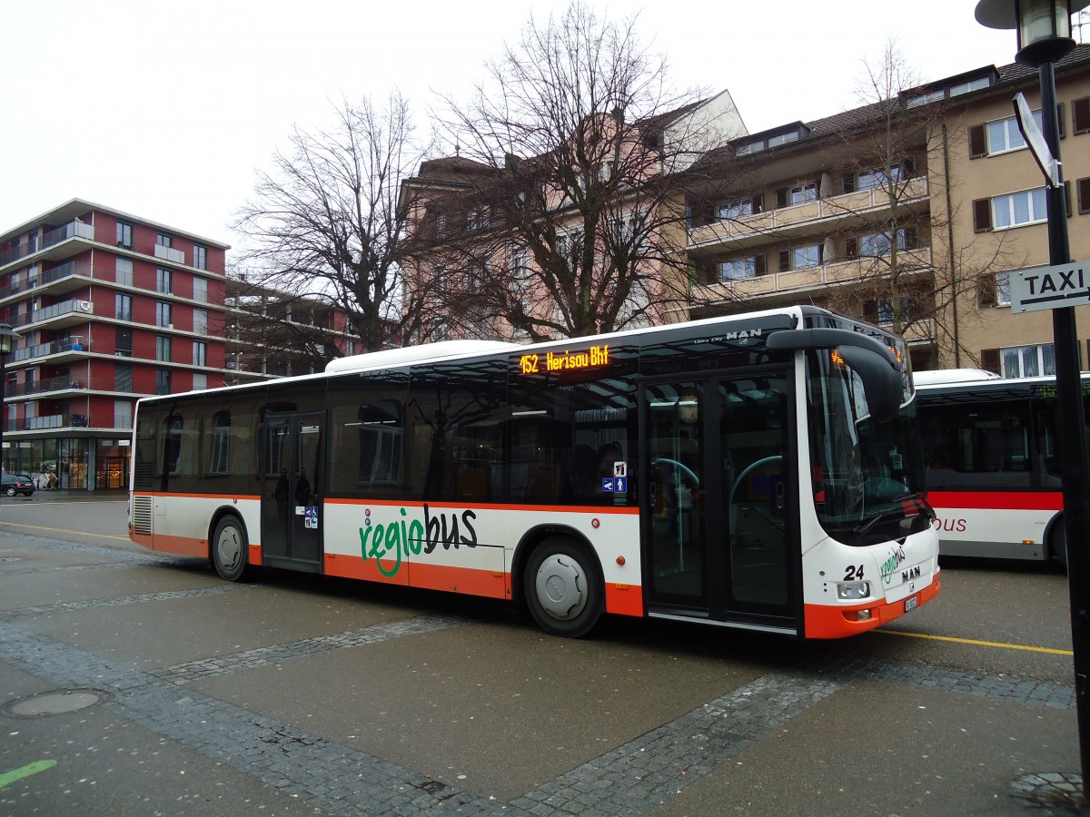 (132'318) - Regiobus, Gossau - Nr. 24/SG 88'221 - MAN am 12. Januar 2011 beim Bahnhof Gossau