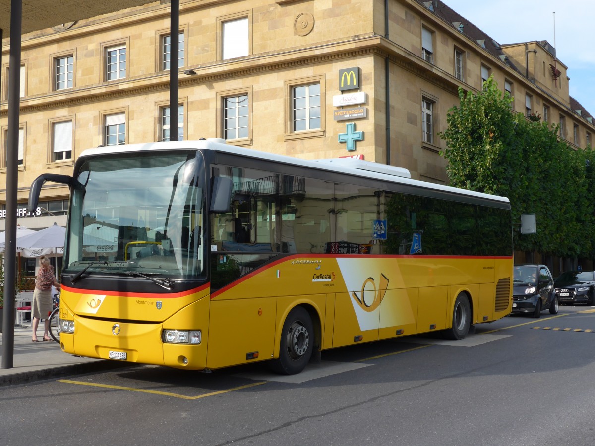 (153'455) - CarPostal Ouest - NE 110'426 - Irisbus am 23. Juli 2014 beim Bahnhof Neuchtel