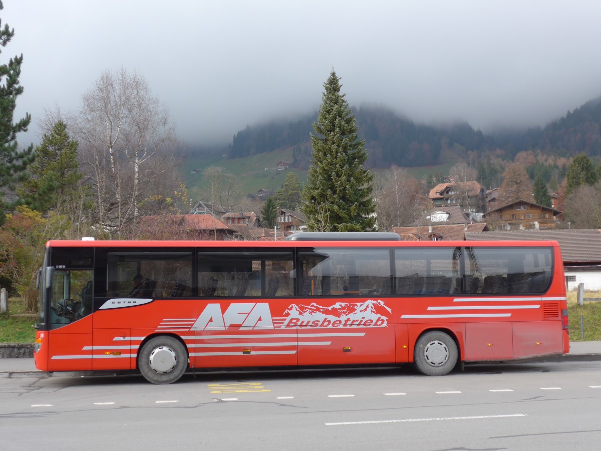 (157'704) - AFA Adelboden - Nr. 24/BE 26'701 - Setra am 7. Dezember 2014 beim Bahnhof Frutigen