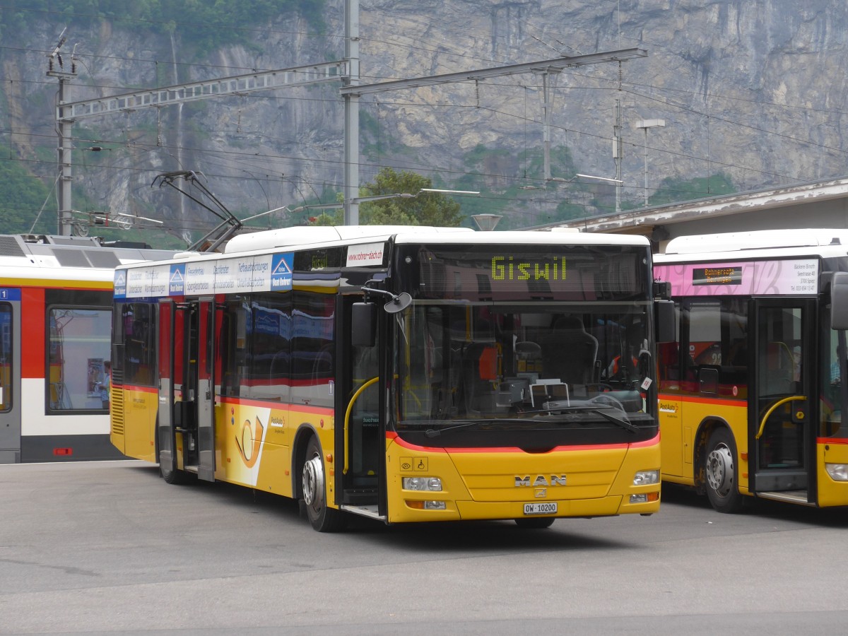 (162'010) - Dillier, Sarnen - Nr. 1/OW 10'200 - MAN am 8. Juni 2015 beim Bahnhof Meiringen