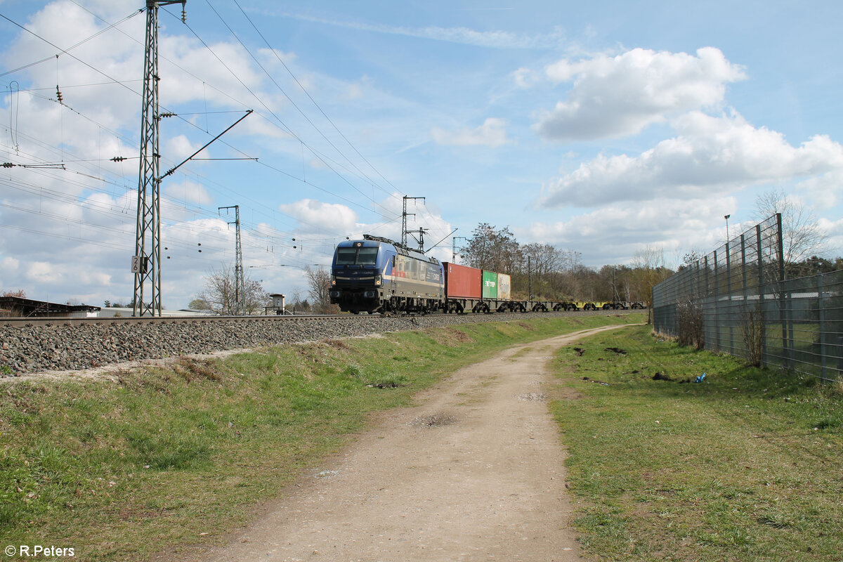 193 565-9  Evolution  mit fast leeren Containerzug in der Treuchtlinger Kurve in Nrnberg Hohe Marter. 25.03.24