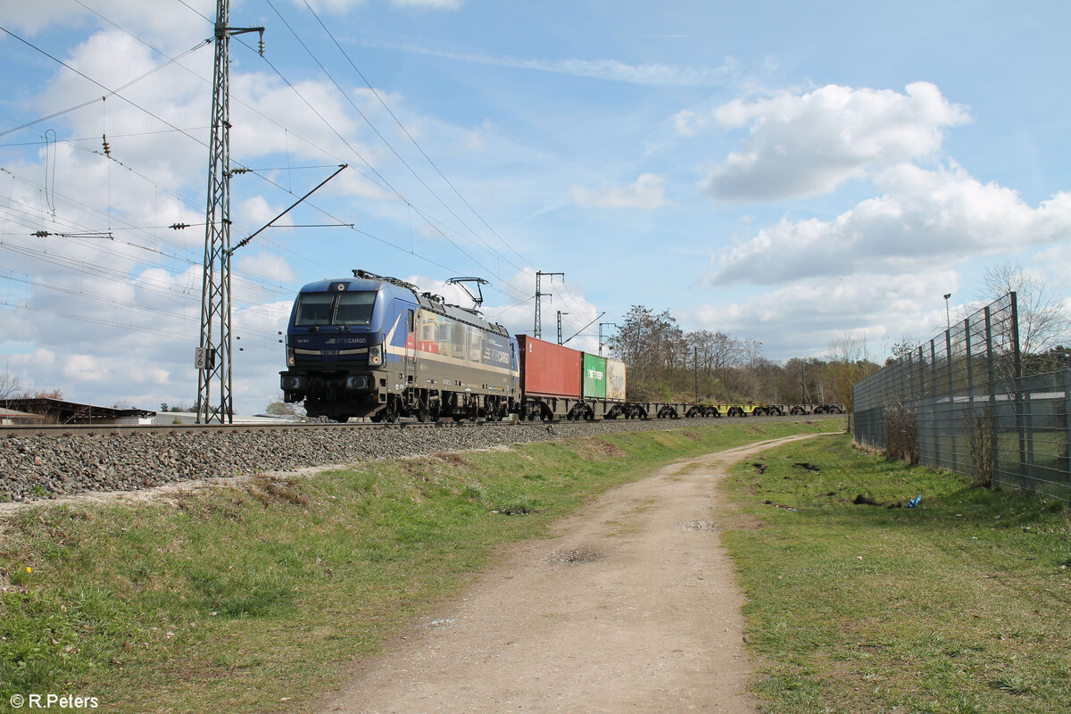 193 565-9  Evolution  mit fast leeren Containerzug in der Treuchtlinger Kurve in Nrnberg Hohe Marter. 25.03.24