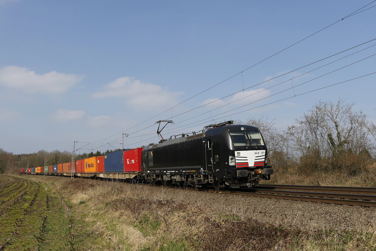 193 871 mit einem Containerzug am 29. M�rz 2019 bei Stubben, zwischen Bremen und Bremerhaven.