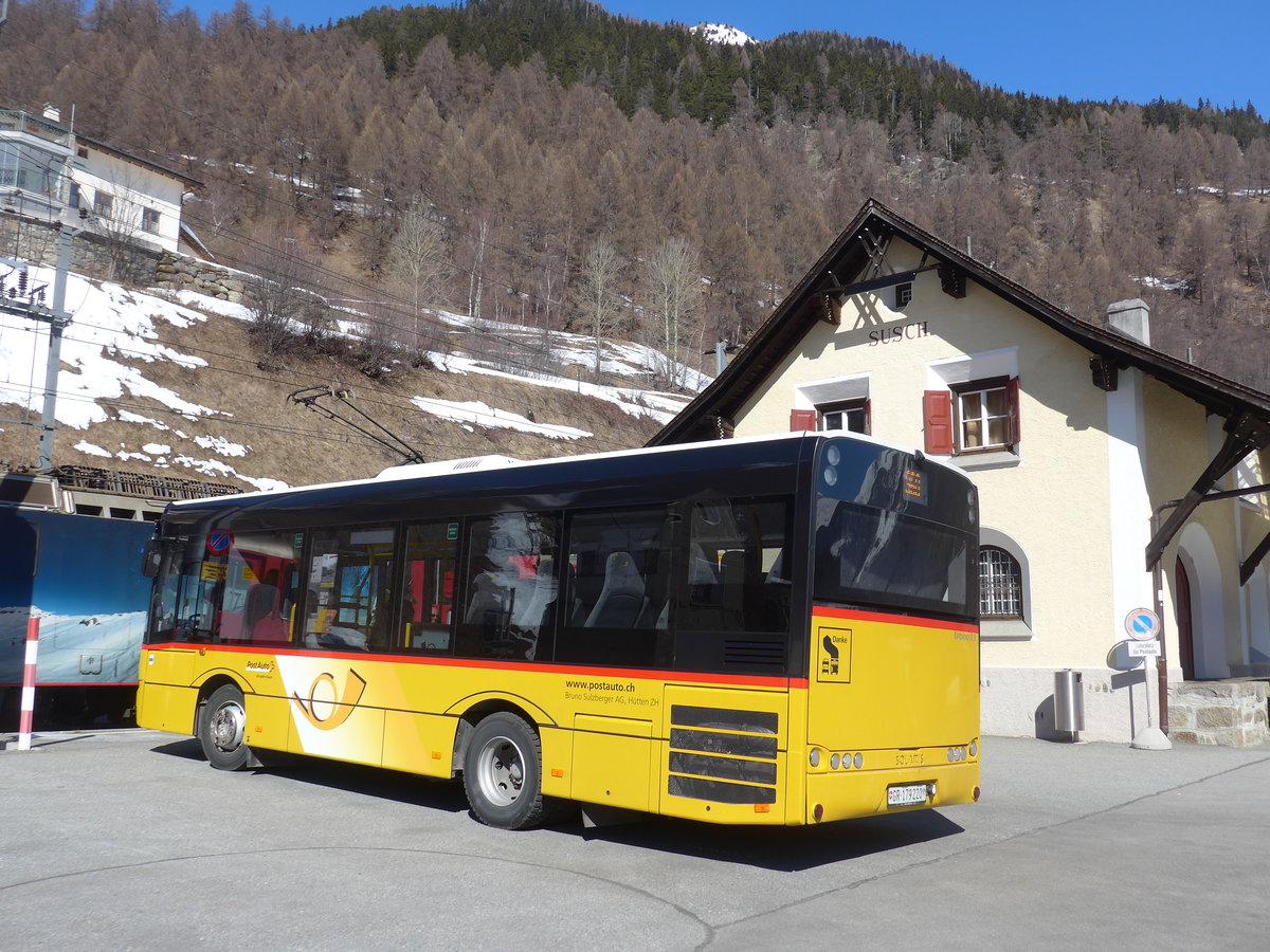 (202'605) - PostAuto Graubnden (Sulzberger) - GR 179'220 - Solaris am 20. Mrz 2019 beim Bahnhof Susch