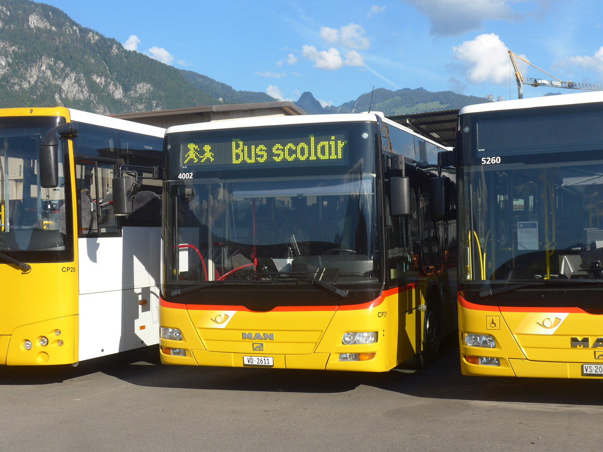 (218'960) - TPC Aigle - Nr. CP31/VD 2611 - MAN/Gppel (ex CarPostal Ouest; ex Rmocar, Mervelier; ex CJ Tramelan Nr. 203) am 25. Juli 2020 in Collombey, Garage (Teilaufnahme)