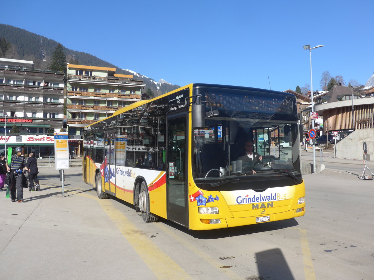 (223'883) - Grindelwaldbus, Grindelwald - Nr. 13/BE 407'170 - MAN/Gppel am 28. Februar 2021 beim Bahnhof Gindelwald