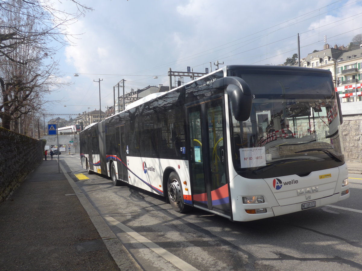 (224'034) - PostAuto Nordschweiz - NE 165'371 - MAN (ex AG 271'181) am 7. Mrz 2021 beim Bahnhof Neuchtel