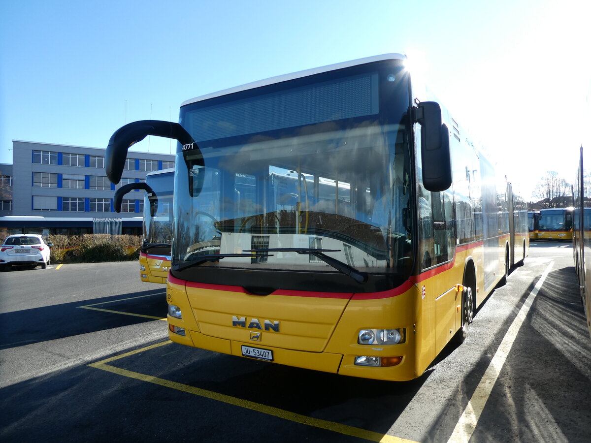 (232'526) - CarPostal Ouest - JU 53'407 - MAN (ex Nr. 37) am 30. Januar 2022 in Yverdon, Garage