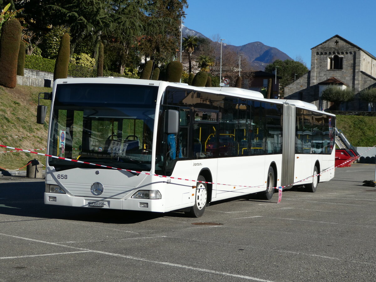 (244'931) - Intertours, Domdidier - Nr. 658/FR 300'658 - Mercedes (ex Nr. 206; ex VZO Grningen Nr. 51) am 10. Januar 2023 beim Bahnhof Locarno