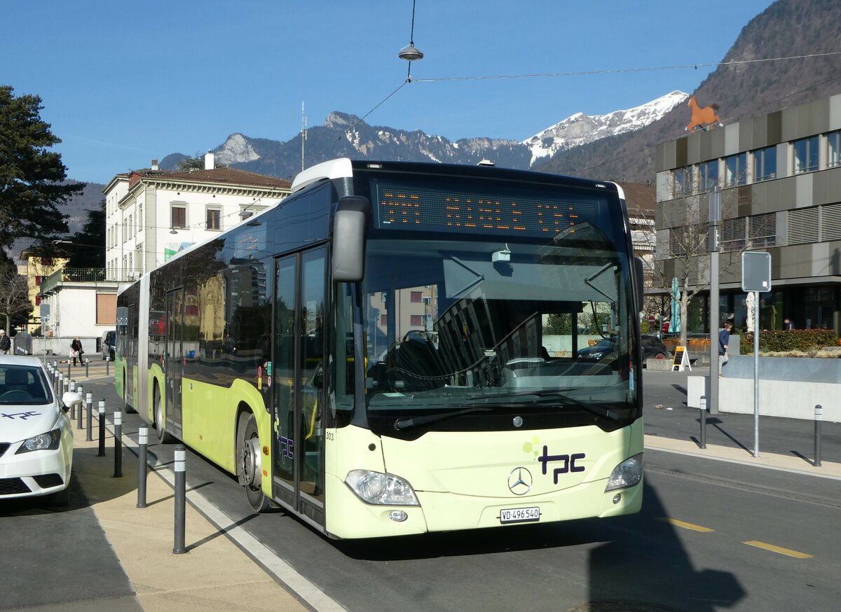 (246'046) - TPC Aigle - Nr. 303/VD 496'540 - Mercedes (ex PostAuto Bern Nr. 633/PID 5473) am 11. Februar 2023 beim Bahnhof Aigle