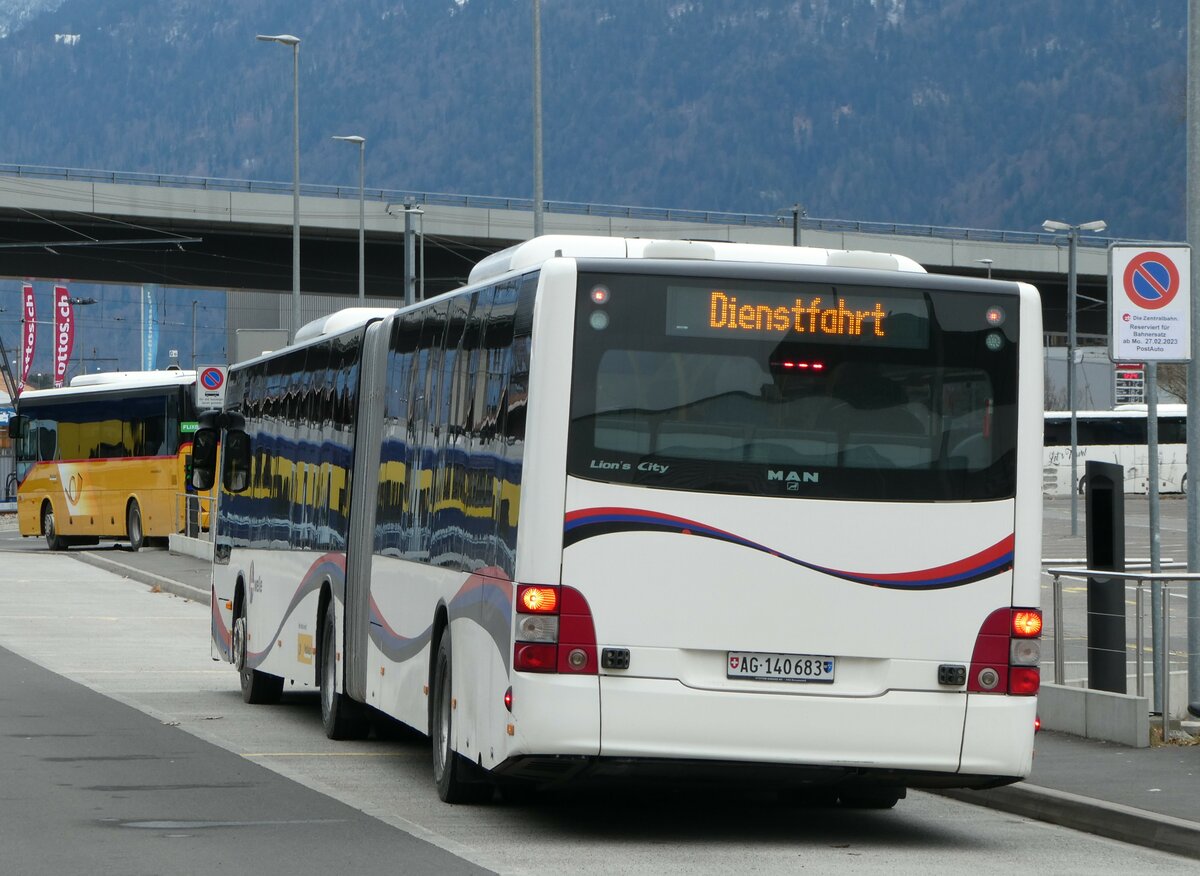 (246'745) - PostAuto Nordschweiz - AG 140'683/PID 5007 - MAN (ex Steffen, Remetschwil Nr. 58) am 27. Februar 2023 beim Bahnhof Interlaken Ost