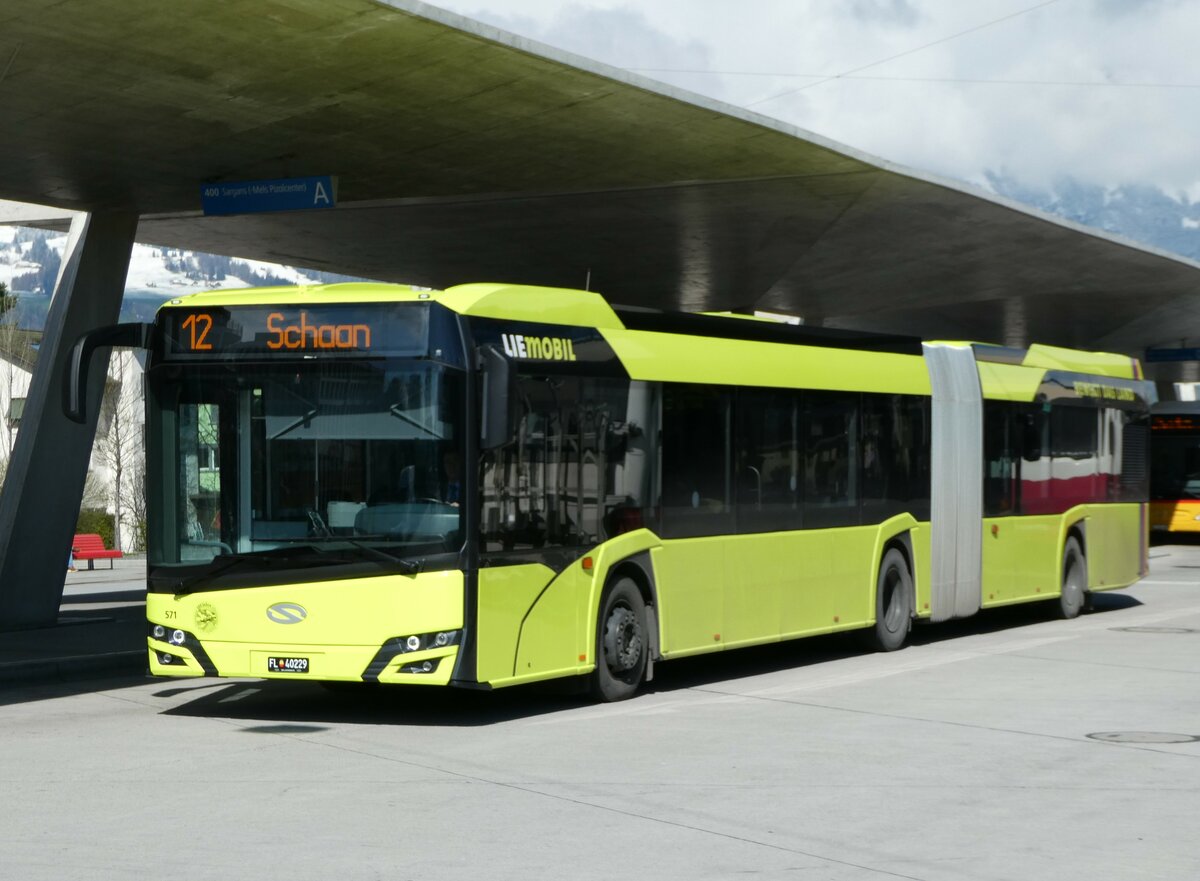 (247'771) - Aus Liechtenstein: BOS PS Anstalt, Vaduz - Nr. 571/FL 40'229 - Solaris am 28. Mrz 2023 beim Bahnhof Buchs