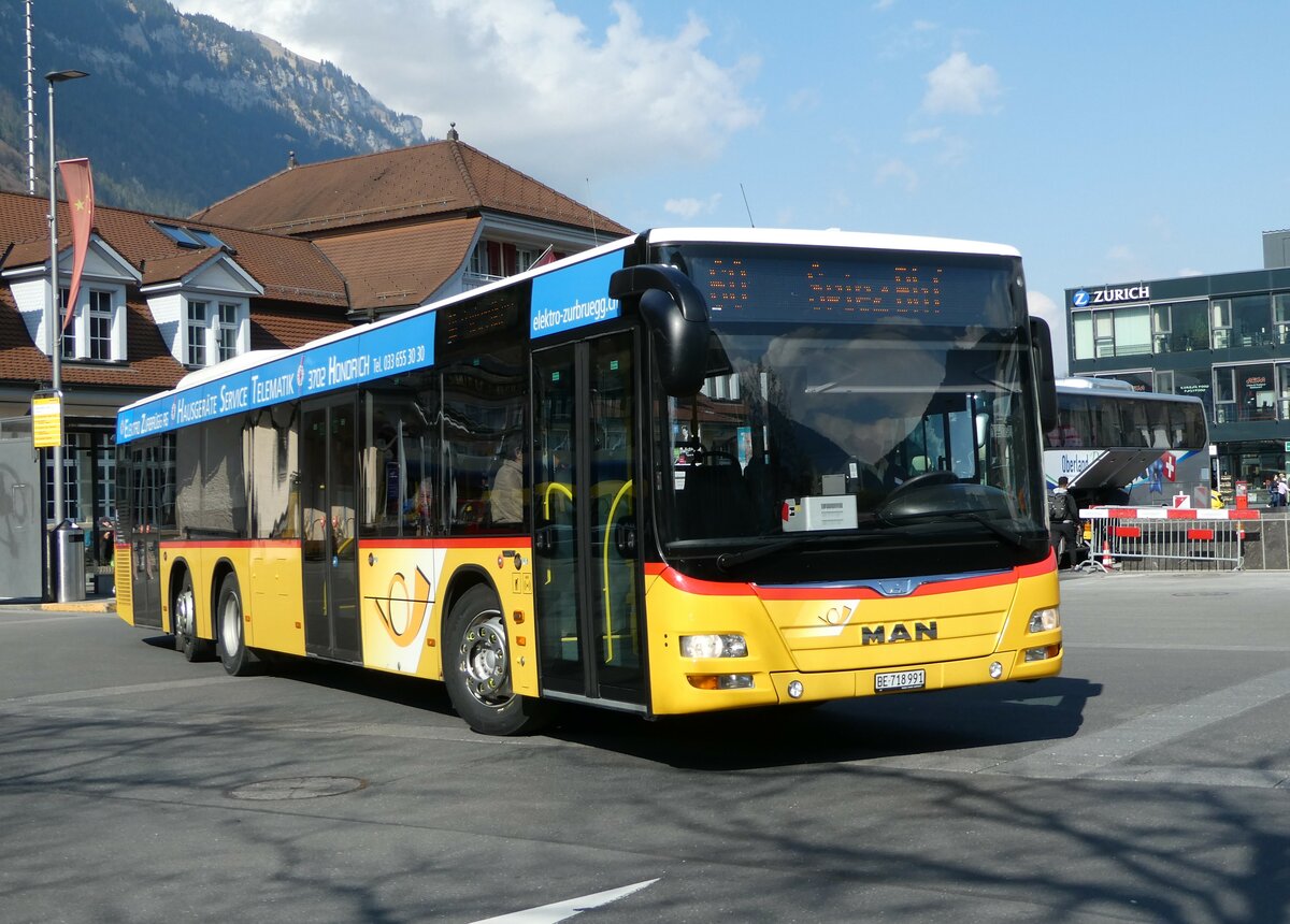 (248'907) - PostAuto Bern - BE 718'991/PID 10'526 - MAN am 19. April 2023 beim Bahnhof Interlaken Ost