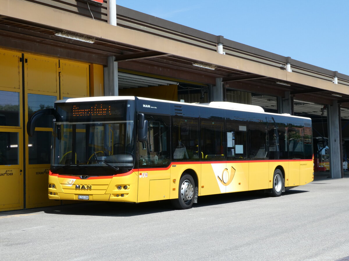 (252'411) - PostAuto Nordschweiz - BL 141'396/PID 10'968 - MAN am 7. Juli 2023 in Laufen, Garage