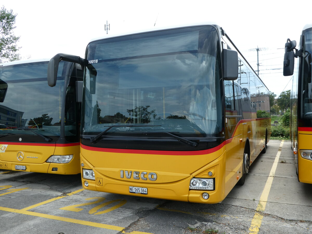 (253'736) - CarPostal Ouest - NE 165'364/PID 10'018 - Iveco (ex TPC Aigle Nr. CP09) am 12. August 2023 in Yverdon, Garage