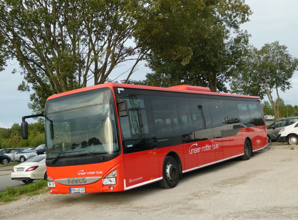 (254'391) - Unser Roter Bus, Ueckermnde - HGW-LB 316 - Iveco am 30. August 2023 in Greifswald, City Automobile