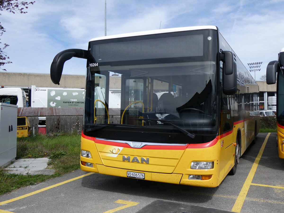 (260'843) - CarPostal Ouest - VD 606'576/PID 10'264 - MAN (ex TSPG Saignelgier) am 29. Mrz 2024 in Yverdon, Garage