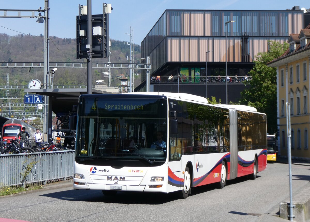 (261'159) - RVBW Wettingen - Nr. 163/AG 7153 - MAN am 12. April 2024 beim Bahnhof Baden