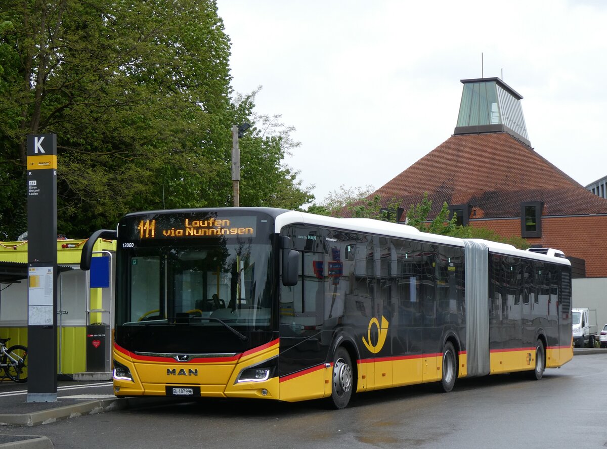 (261'558) - PostAuto Nordschweiz - BL 107'996/PID 12'060 - MAN am 19. April 2024 beim Bahnhof Liestal