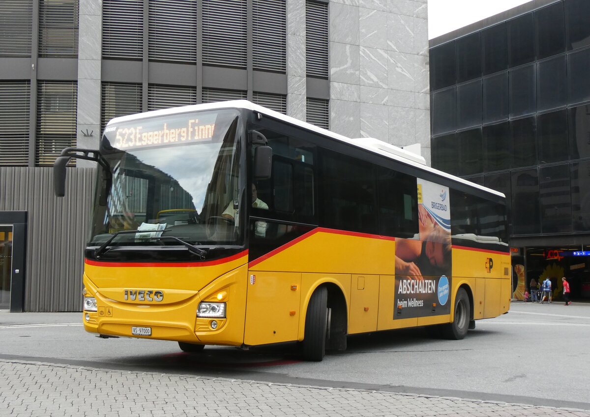 (265'365) - BUS-trans, Visp - VS 97'000/PID 10'088 - Iveco am 3. August 2024 beim Bahnhof Visp