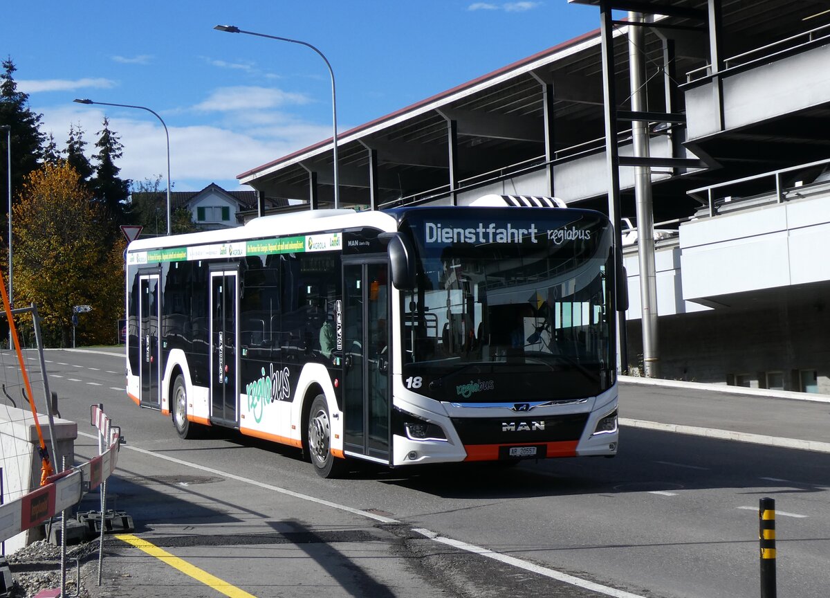 (268'208) - VBH Herisau - Nr. 18/AR 20'557 - MAN am 17. Oktober 2024 beim Bahnhof Herisau