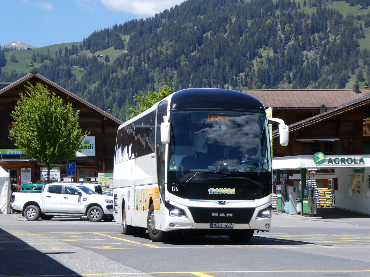 (275'614) - Aus Litauen: Jouzapaviciaus, Kaunas - Nr. 126/MDH 487 - MAN am 16. Mai 2025 beim Bahnhof Gstaad