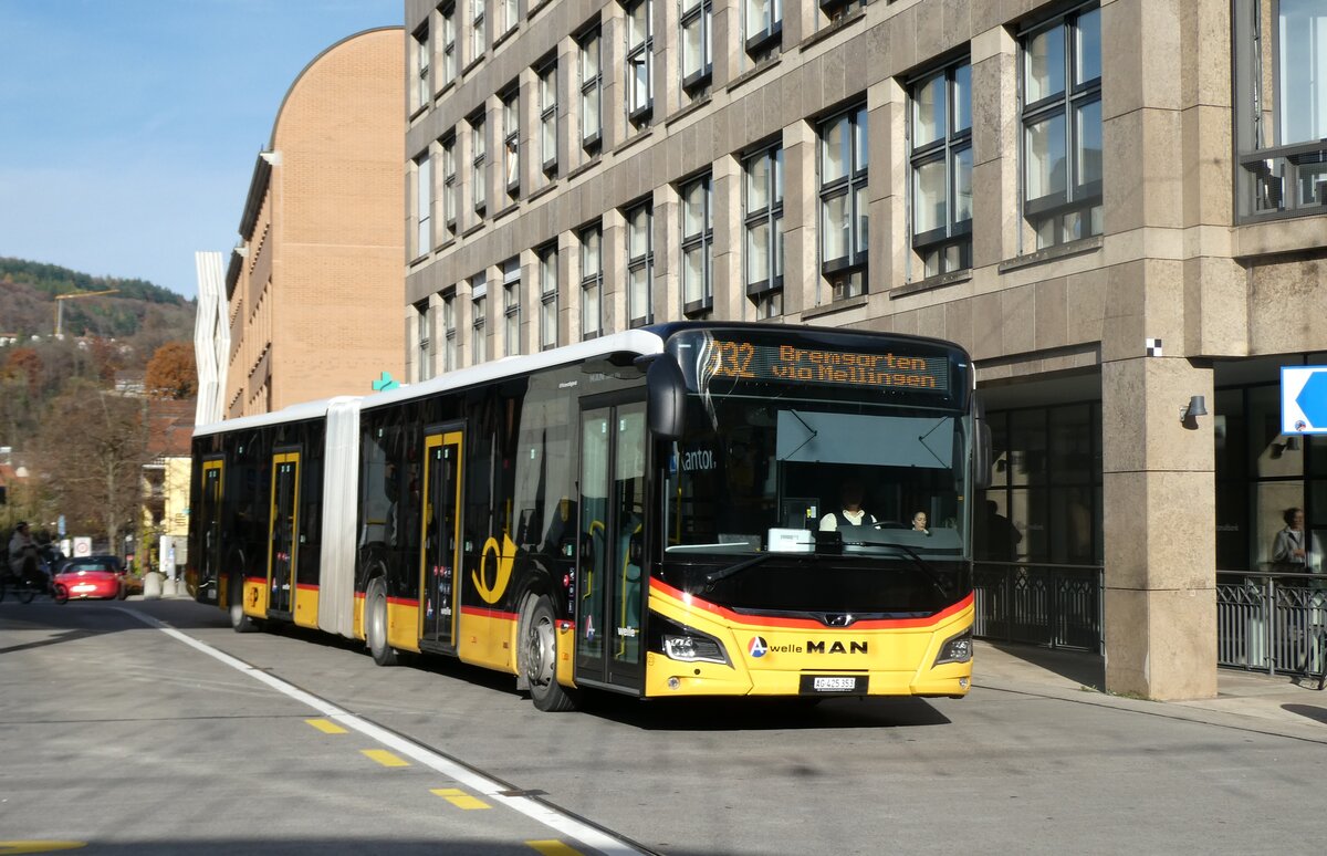 (282'337) - Twerenbold, Baden - Nr. 23/AG 425'353/PID 12'046 - MAN am 11. November 2025 beim Bahnhof Baden