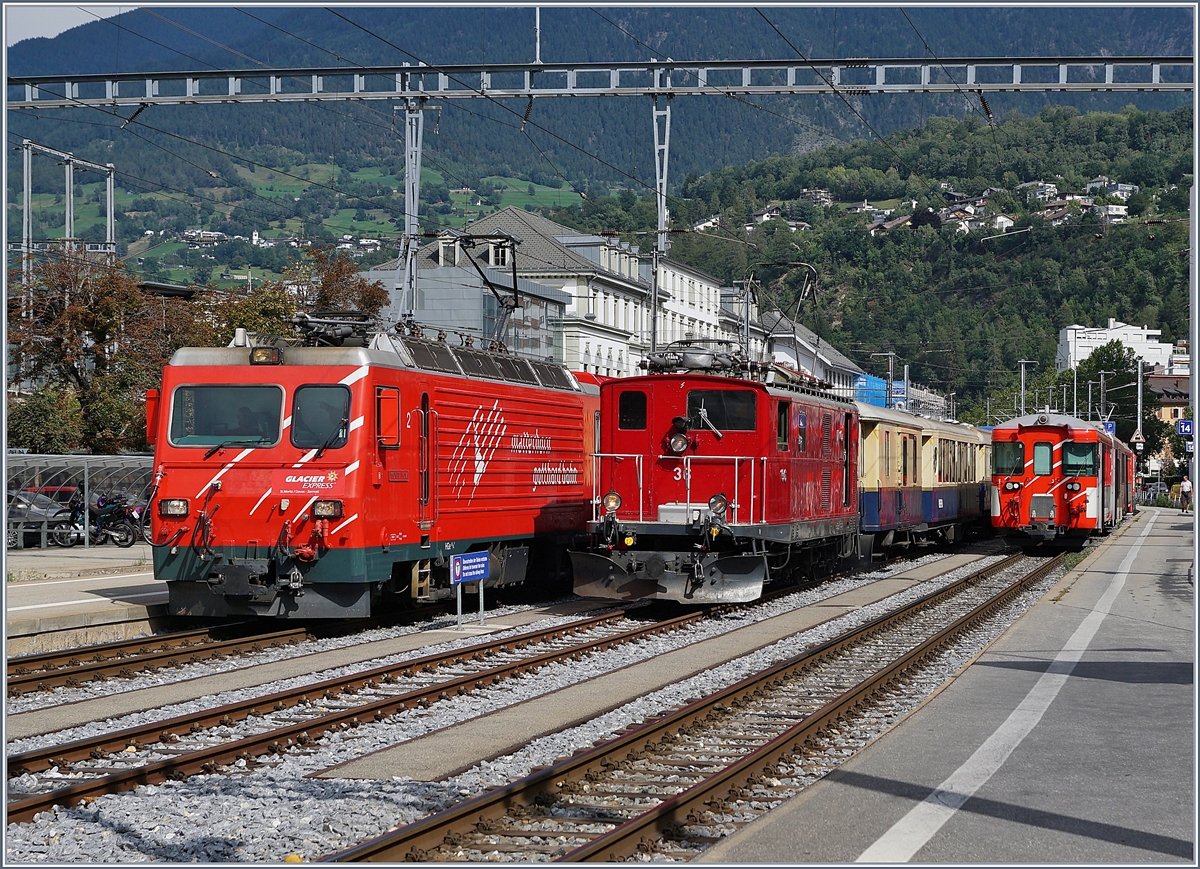 Auf der Rückfahrt, welch freudige Überraschung, stand im MGB Bahnhof von Brig neben der MGB HGe 4/4 II  Monte Rosa  die FO HGe 4/4 36 (Baujahr 1948) mit dem  Glacier Pullman Express . 31. August 2019